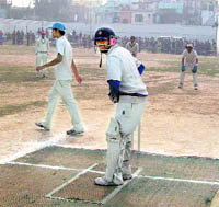 A batsman gets ready for a delivery at the 8th All-India Cricket Tournament for United Cup in Roorkee on Friday.