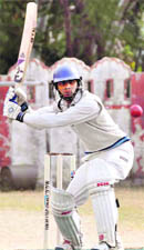 A match in progress at the District Cricket League in Dehradun on Friday.