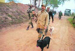 BSF jawans patrol the area near the Abdulian post in the RS Pura sector 