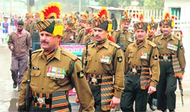 Army personnel come out of MA Stadium in Jammu on Friday after a rehearsal for Republic Day.