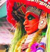 A dancer from Kerala poses during a preview of the tableaux taking part in the R-Day parade in New Delhi.