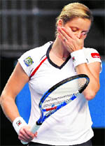 Kim Clijsters reacts to losing a point against Nadia Petrova on Friday