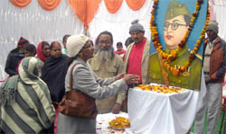 People offering floral tributes to Netaji Subhash Chandra Bose during a function held on the occasion of his birth anniversary in Abohar on Saturday