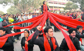 Students of the Chandigarh College of Engineering and Technology, Sector 26, stage a play in Sector 17, Chandigarh, on Saturday.