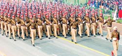 Delhi police personnel march during the full dress rehearsal for the Republic Day Parade in New Delhi 