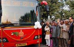 Haryana Chief Minister Bhupinder Singh Hooda launches city bus service in Faridabad
