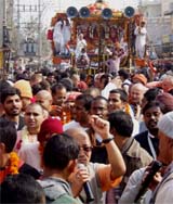 Devotees participate in the Jagannath Yatra organised by ISKCON 