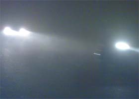 Two cars travel in almost zero visibility as a result of thick fog cover in Jalandhar