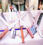 Sharp-edged weapons and mobile phones captured from the student union leader at Jagraon