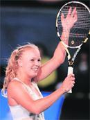 Caroline Wozniacki celbrates afterbeating Shahar Peer.