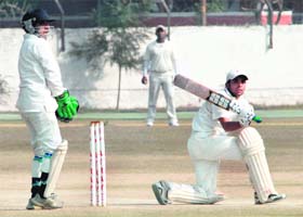 A batsman plays a shot during the Inter-Media Cricket Tournament in Sector 26, Chandigarh