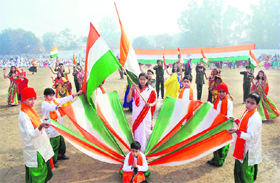 Students participate in a full-dress rehearsal for the Republic Day celebrations at Karna Stadium in Karnal on Sunday. 
