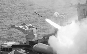 A surface-to-air missile is fired from the naval warship 'Rana' during an exercise in the Bay of Bengal in Chennai on Sunday. The Navy showcased a variety of operations undertaken by them in all three dimensions of air, surface and sub-surface, according to a media release.