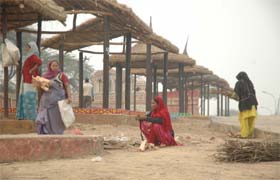 Women at work for the upcoming mela