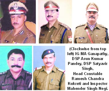 (Clockwise from top left) IG MA Ganapathy, DSP Arun Kumar Pandey, DSP Satyavir Singh, Head Constable Ramesh Chandra Kukreti and Inspector Mahender Singh Negi.