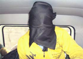 Ali being taken for interrogation in Roorkee