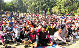 Ministerial employees stage a demonstration at the Gandhi Park in Dehradun on Monday