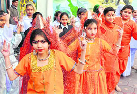  Schoolchildren celebrate Republic Day in Jammu on Monday.