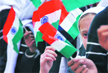 Students hold the Tricolour as they celebrate Republic Day in Ludhiana on Monday.