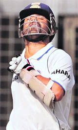 Sachin Tendulkar looks to the heavens after completing his 45th Test century, against Bangladesh in Dhaka on Monday.