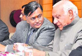 State minister for industry and local bodies Manoranjan Kalia (L) with BJP leader Balramji Das Tandon during a meeting organised in Ludhiana