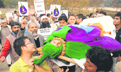 Students and professors of Panjab University hold a procession against Bt brinjal at Students Centre on Thursday. 