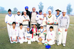 The winning team of Black Elephant Cricket Club strike a pose in Patiala.