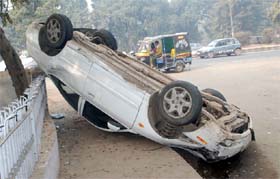 A fast-moving Hyundai Elantra car turned turtle near Sector 31 in Faridabad