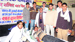 Members of the DYFI donate blood on the Republic Day at Jodhkan in Sirsa. 