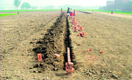 A brick road being constructed on a plot at Gyaspura road in Ludhiana.