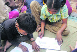 Slum children participate in a painting competition at Rajpura.