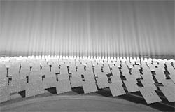 A general view shows a "solucar" solar park in Sanlucar La Mayor, near Seville . So far, wind turbines are not Sputnik. But one day they could be. The global race to develop clean technology is not just about who can build the best solar parks or wind farms. It is also shaping up as a contest between Chinese-style capitalism and the more market-oriented approach fancied by the United States and Europe.