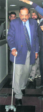 Former Haryana DGP SPS Rathore comes out of the cardiac centre at the PGI in Chandigarh on Friday.