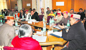 Chief Minister Prem Kumar Dhumal presiding over a meeting of the Gujjar Kalyan Board at Dharamsala on Friday.