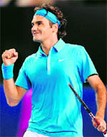 Roger Federer celebrates after beating Jo-Wilfried Tsonga on Friday