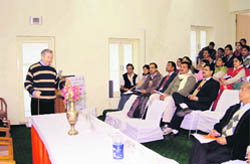 Prof GP Brasseur from Hamburg University, Germany, delivers a lecture in Nainital 