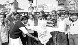 Activists of Bhavadas burn an effity of the SAD-BJP government in Ludhiana on Saturday