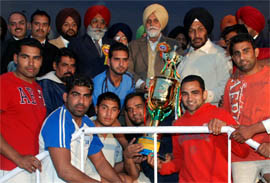Players of the Ambi Hathoor Club, Moga, in jubilant mood after winning the fifth Indo-Canadian Kabaddi Cup in Bathinda on Sunday