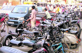 Vehicles parked on roadside at Mata Rani Chowk in Ludhiana