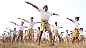 Rashtriya Swayamsevak Sangh workers show their skills during a session in Guwahati on Sunday.
