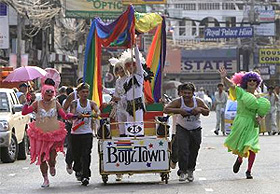 Participants pull a decorated hospital bed during the Pattaya International Bed Race in the eastern beach town of Pattaya on Sunday. The event was held to raise funds for Rotary Club of Pattaya and to promote tourism.