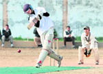 A batsman plays a shot on the Satluj grounds, Panchkula, 