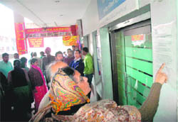 Parents check the notice outside the UK visa application centre at Sector 8 in Chandigarh