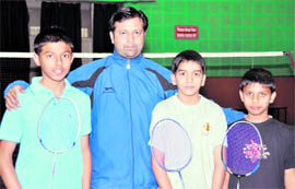 The sub-junior badminton players from Dehradun with their coach Deepak Rawat in Dehradun.