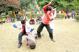A nukkad play being staged by members of the HUM organisation at the Gandhi Park in Dehradun on Sunday.