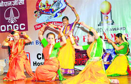 A dance troupe gives a performance.