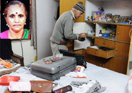A member of the investigating agency checks the site at Sector 22 in Gurgaon where a 65-year-old woman, Sawitri Devi, was murdered on Monday.
