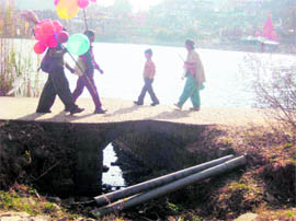The Rewalsar lake, identified under the National Wetland Conservation programme, stands badly polluted due to inflow of dirty water from nearby areas in Mandi on Monday.