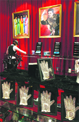 Souvenirs are displayed in a store at the MJ Gallery inside a Macau resort. The gallery opened on Monday, displaying 42 items related to the late Michael Jackson.