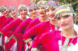 Students of MCM DAV College queue up to perform a tribal dance on Environment Day in Chandigarh on Tuesday.